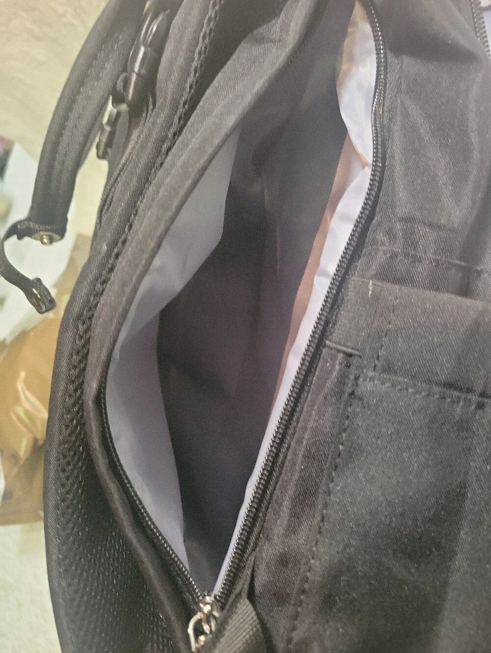 Black Quilted Backpack with Tan Accents